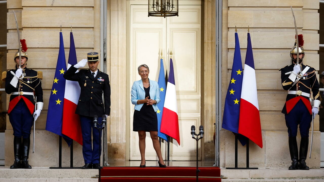 France's newly appointed Prime Minister Elisabeth Borne looks on during a handover ceremony in the courtyard of the Hotel Matignon, French Prime ministers' official residence, in Paris on May 16, 2022. (Photo by CHRISTIAN HARTMANN / POOL / AFP)