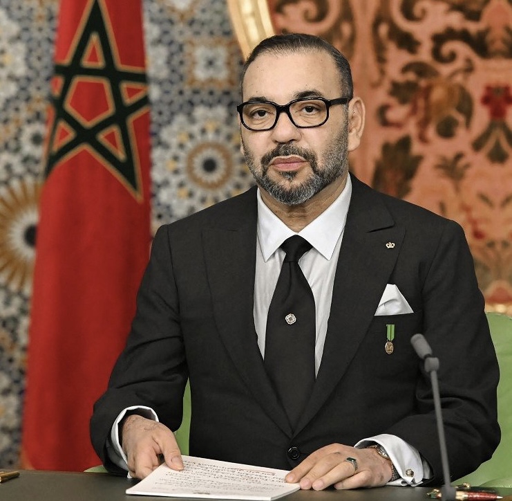 A handout picture released by the Moroccan Royal Palace on November 6, 2021, shows King Mohammed VI delivering a speech to the nation on the occasion of the 46th anniversary of the Green March, in the capital Rabat. - Morocco's King Mohamed VI said that Western Sahara is "not negotiable", as tensions flared with Algeria over the disputed territory. In 1975, the king's father, Hassan II, sent 350,000 civilian volunteers on the iconic march into the Western Sahara. (Photo by Moroccan Royal Palace / AFP) / RESTRICTED TO EDITORIAL USE - MANDATORY CREDIT "AFP PHOTO / SOURCE / MOROCCAN ROYAL PALACE- NO MARKETING NO ADVERTISING CAMPAIGNS - DISTRIBUTED AS A SERVICE TO CLIENTS